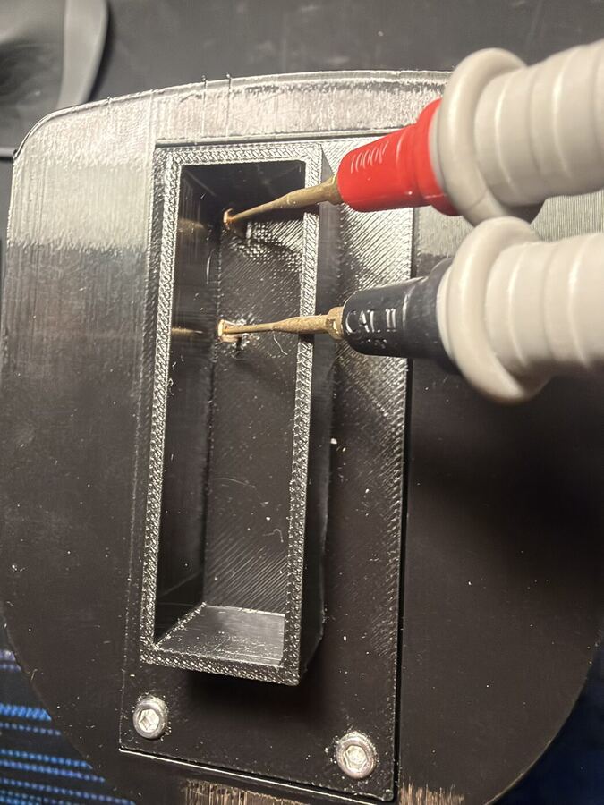 Verifying 13.8V output at the Plug spades