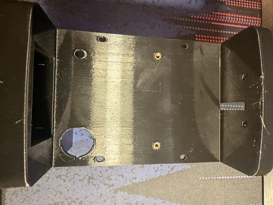 Body interior showing converter-mount inserts
