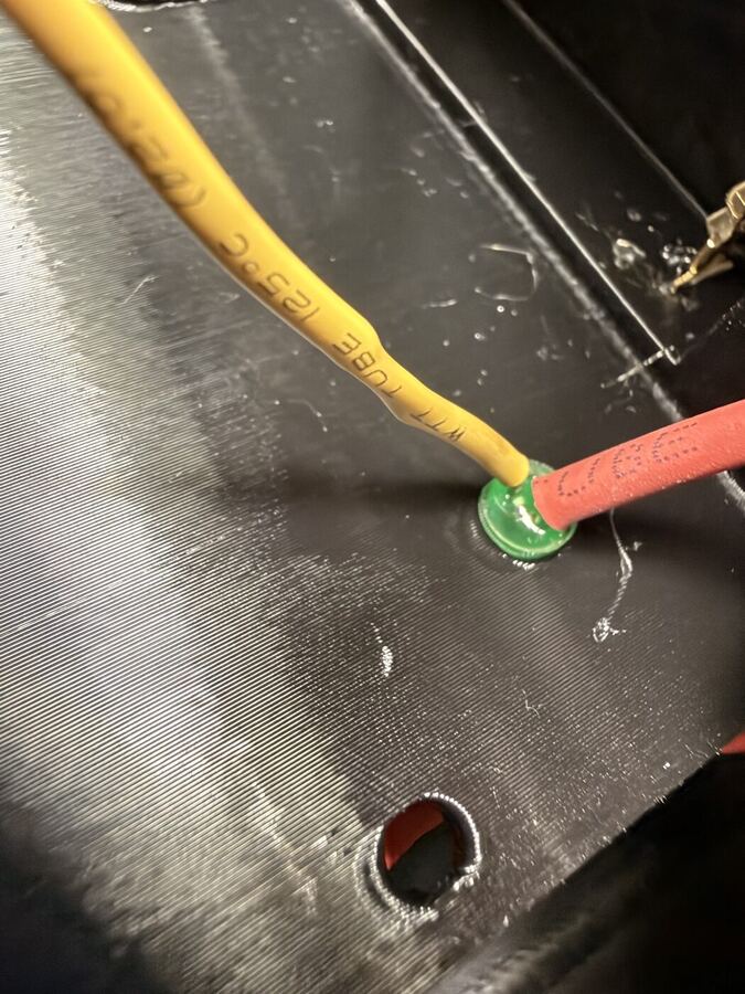 Output wire routing inside the Body